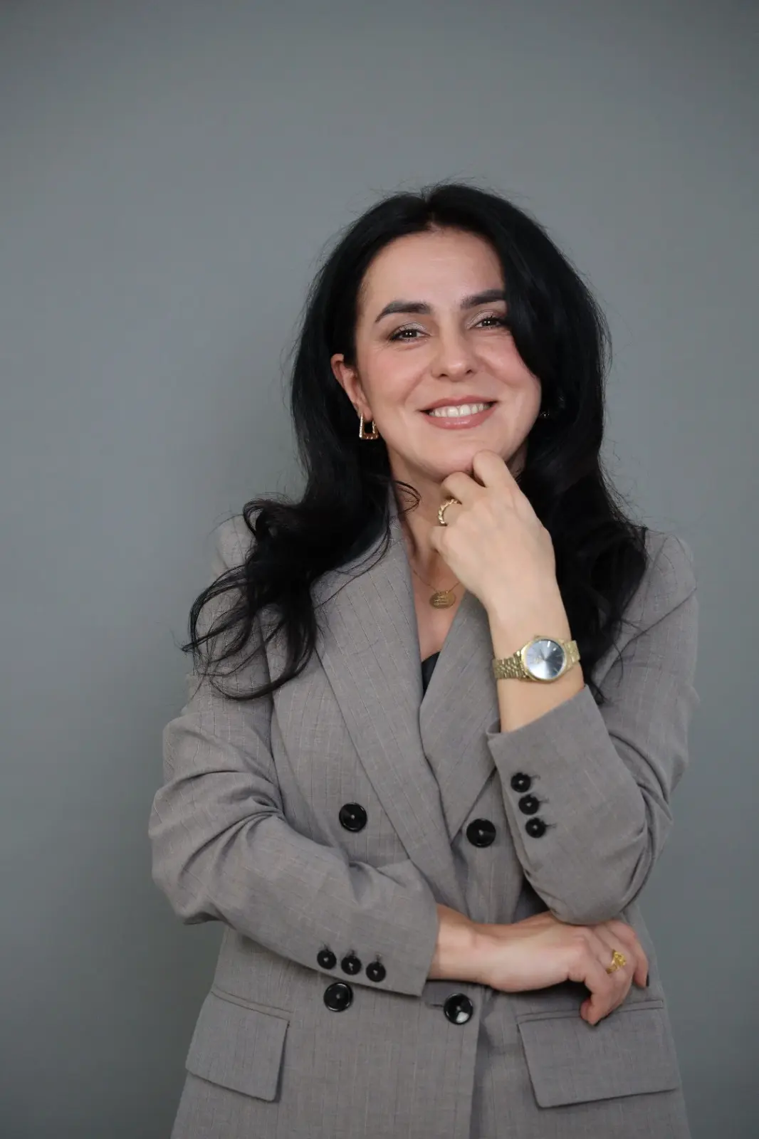 Adisa in elegant black dress, representing confidence and personal growth